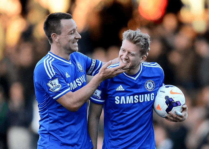 Hat trick hero Andre Schurrle celebrating winning the match ball with John Terry