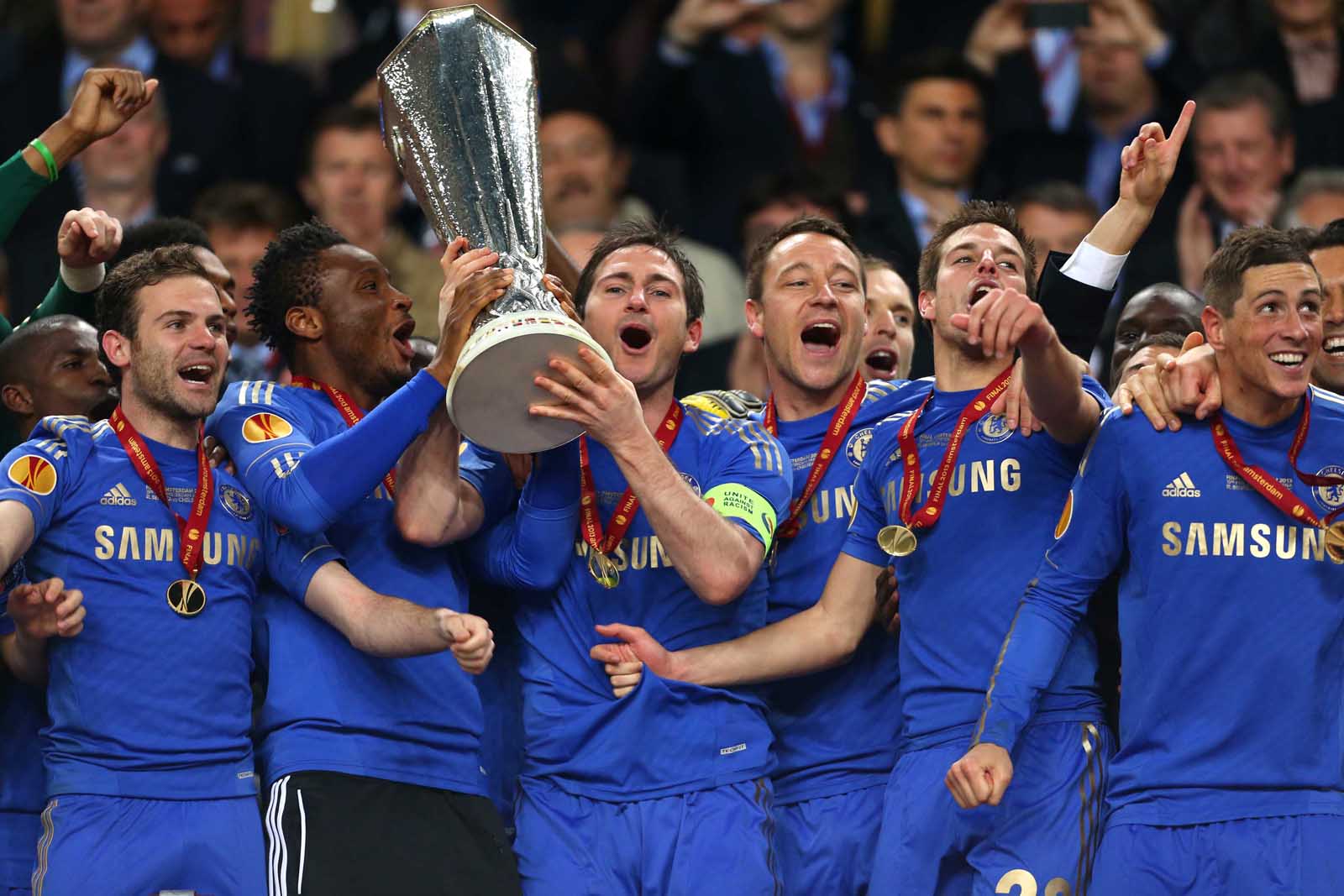15th May 2013 - UEFA Europa League Final - SL Benfica v Chelsea - Frank Lampard of Chelsea lifts the trophy alongside, L-R, Juan Mata, Mikel John Obi, John Terry, Cesar Azpilicueta and Fernando Torres - Photo: Simon Stacpoole / Offside.
