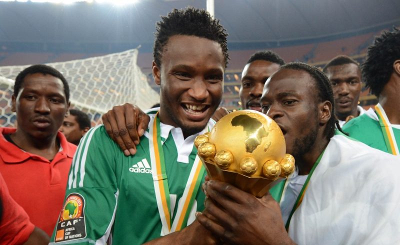 Nigeria's John Obi Mikel and Victor Moses celebrating the win of the Africa Cup of Nations in 2013.