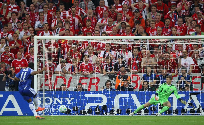 MUNICH, GERMANY - MAY 19: Didier Drogba of Chelsea scores the winning penalty against goalkeeper Manuel Neuer during UEFA Champions League Final between FC Bayern Muenchen and Chelsea at the Fussball Arena M?nchen on May 19, 2012 in Munich, Germany. (Photo by Alex Livesey/Getty Images)
