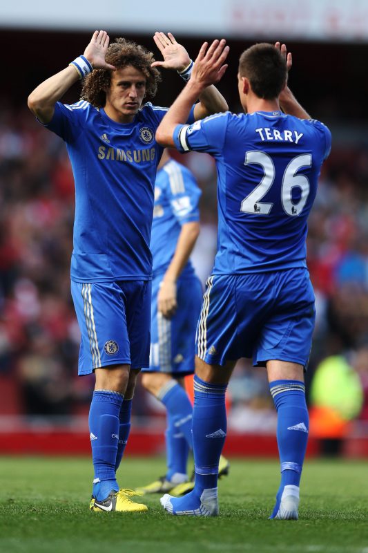 LONDON, ENGLAND - SEPTEMBER 29:  Chelsea's John Terry and David Luiz celebrate after Chelsea defeats Arsenal at the Barclays Premier League match between Arsenal and Chelsea at Emirates Stadium on September 29, 2012 in London, England.  (Photo by Richard Heathcote/Getty Images)