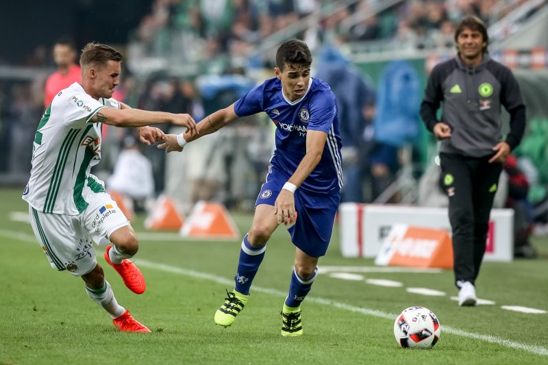 VIENNA, AUSTRIA - JULY 16:  Oscar (R) of Chelsea competes for the ball with Mario Pavelic (L) of Rapid Vienna during an friendly match between SK Rapid Vienna and Chelsea F.C. at Allianz Stadion on July 16, 2016 in Vienna, Austria.  (Photo by Matej Divizna/Getty Images)