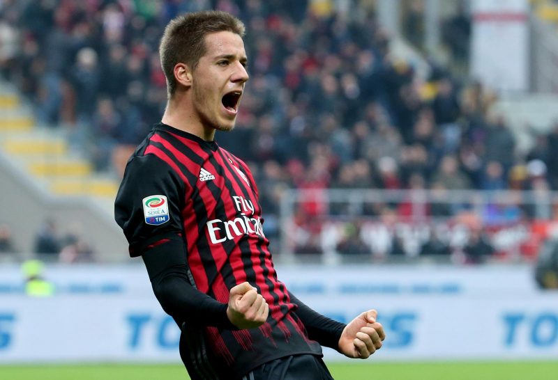 AC Milan's Mario Passaic celebrates after scoring during the Serie A soccer match between AC Milan and Crotone at the San Siro stadium in Milan, Italy, Sunday, Dec. 4, 2016. (Matteo Bazzi/ANSA via AP)