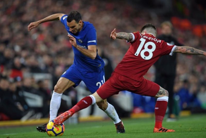 Davide Zappacosta takes on Liverpool's Alberto Moreno.