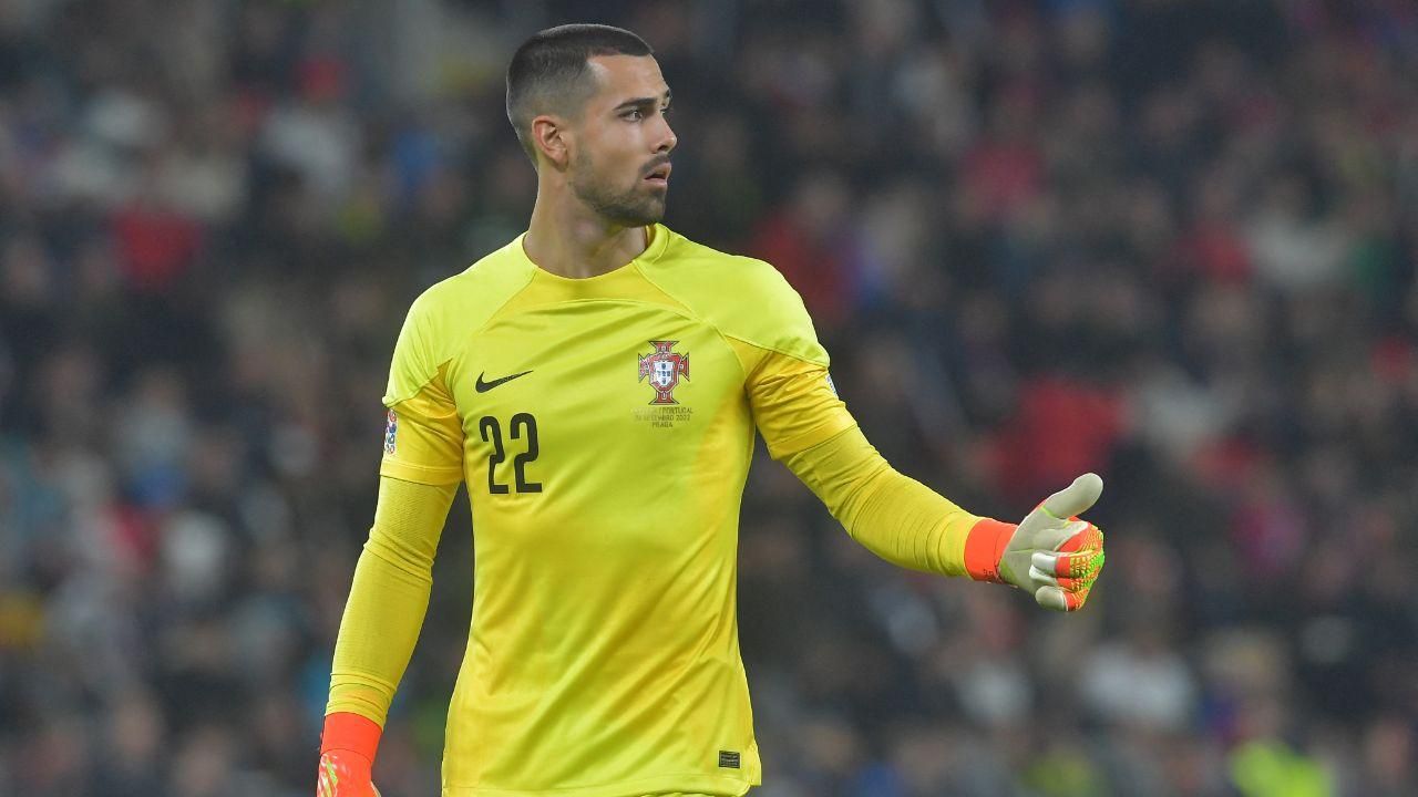 Diogo Costa gives a thumbs up playing for Portugal.