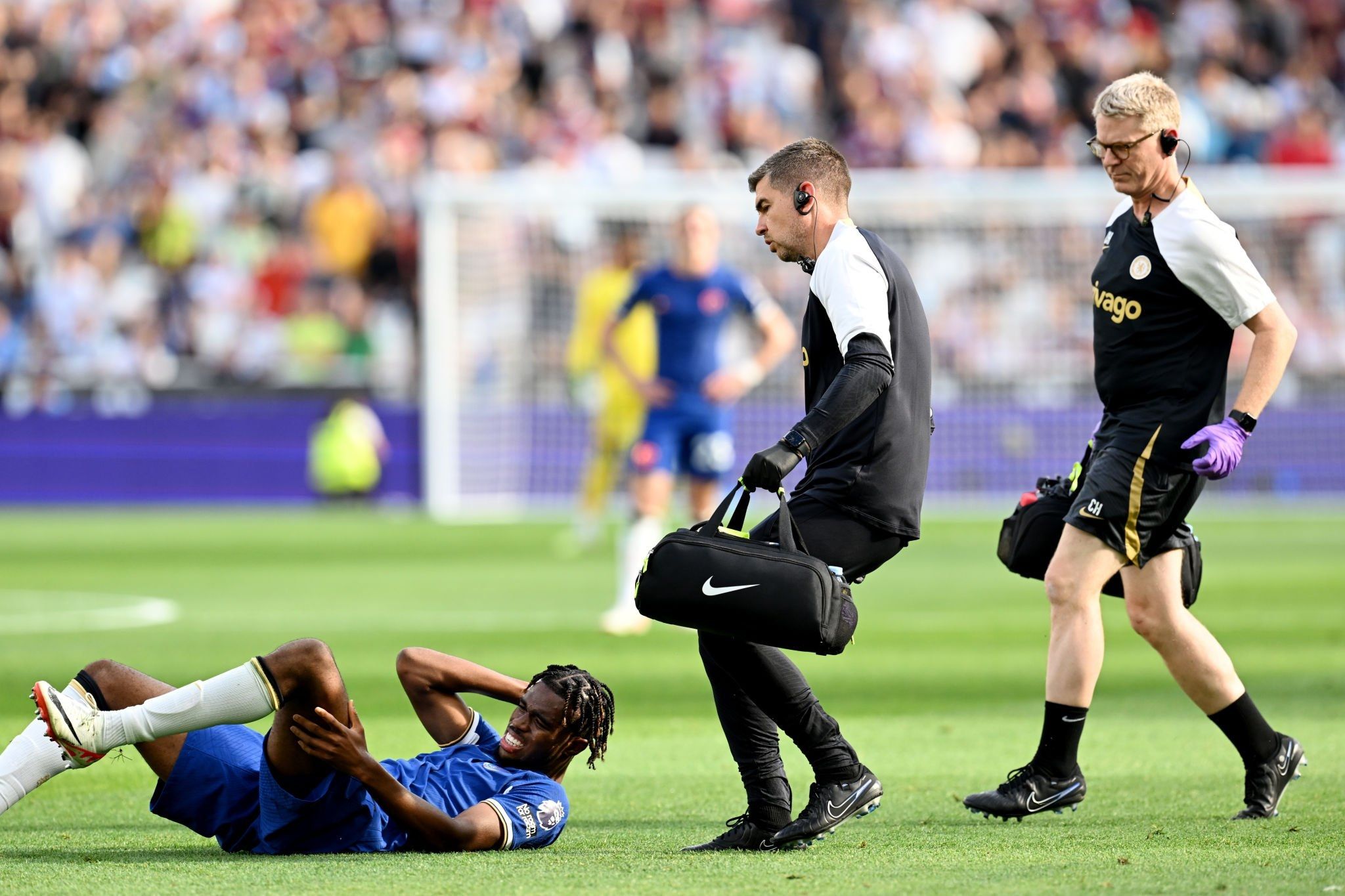 Carney Chukwuemeka lies injured. Carney Chukwuemeka lies injured.