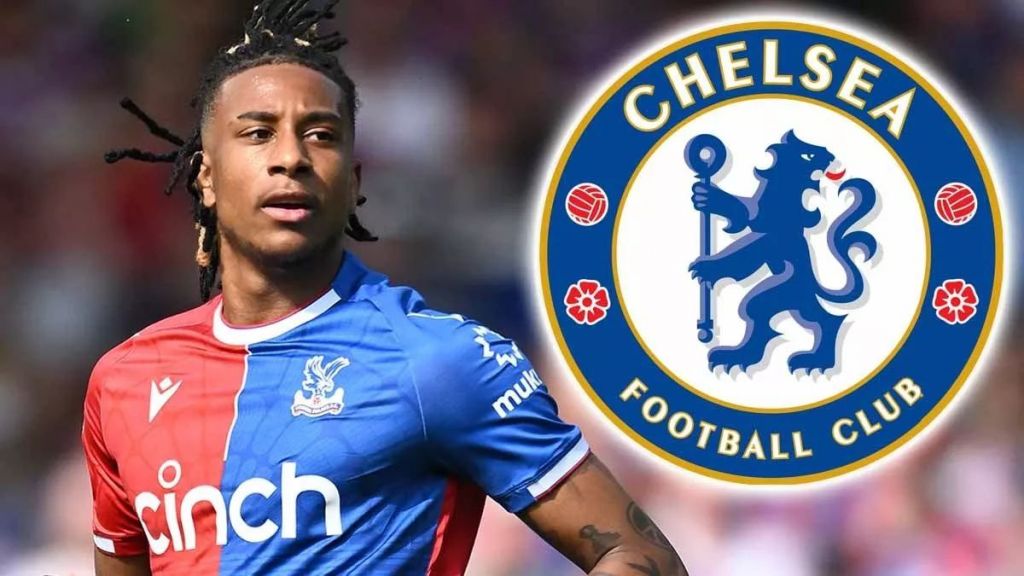 Michael Olise with the Chelsea badge