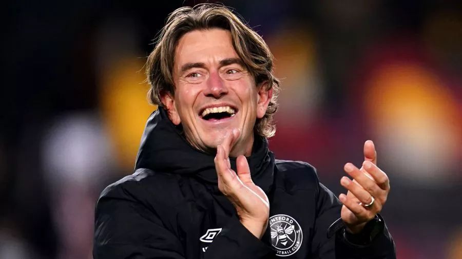 Thomas Frank applauds the Brentford fans.