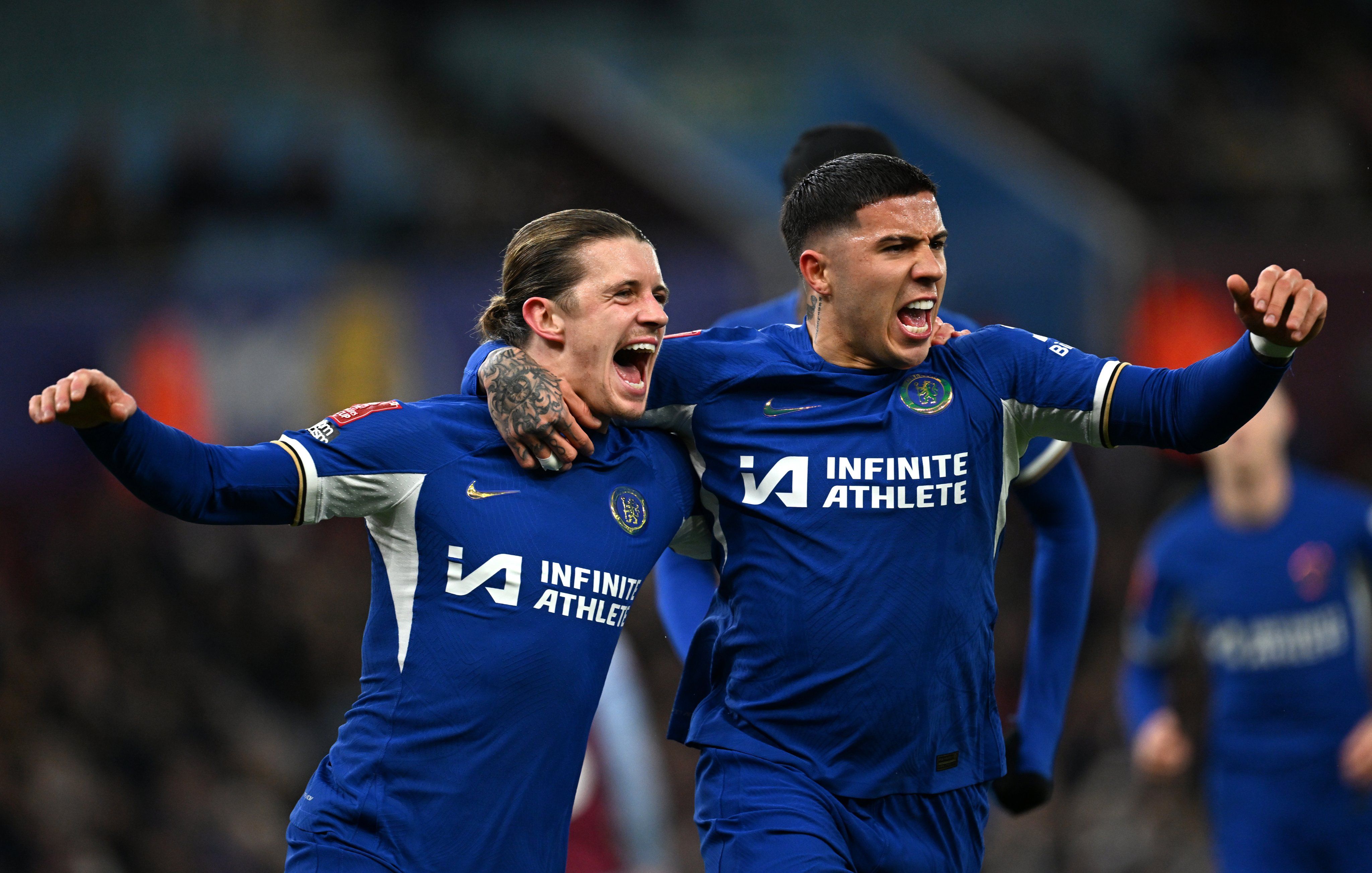Conor Gallagher celebrates with Enzo Fernandez.