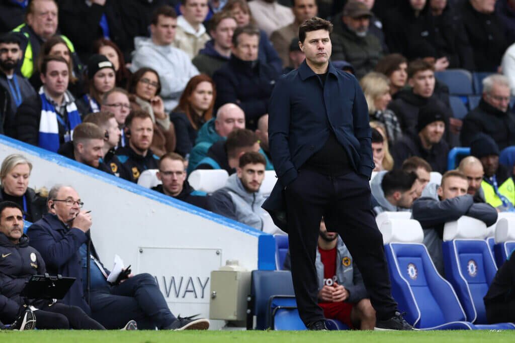 Mauricio Pochettino pensive on the sideline.