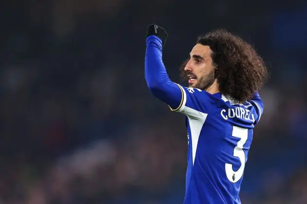 Marc Cucurella signals to a teammate.