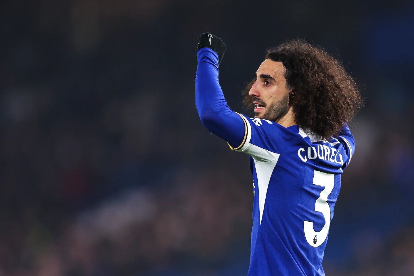 Marc Cucurella signals to a teammate.