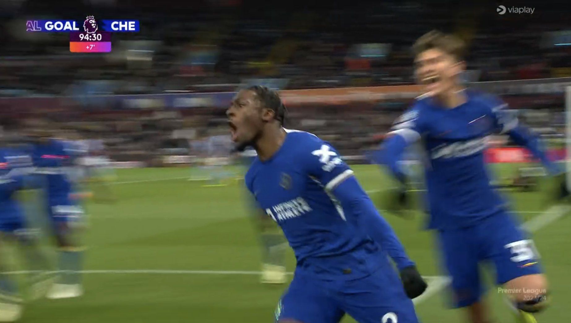 Axel Disasi celebrates a late winner.