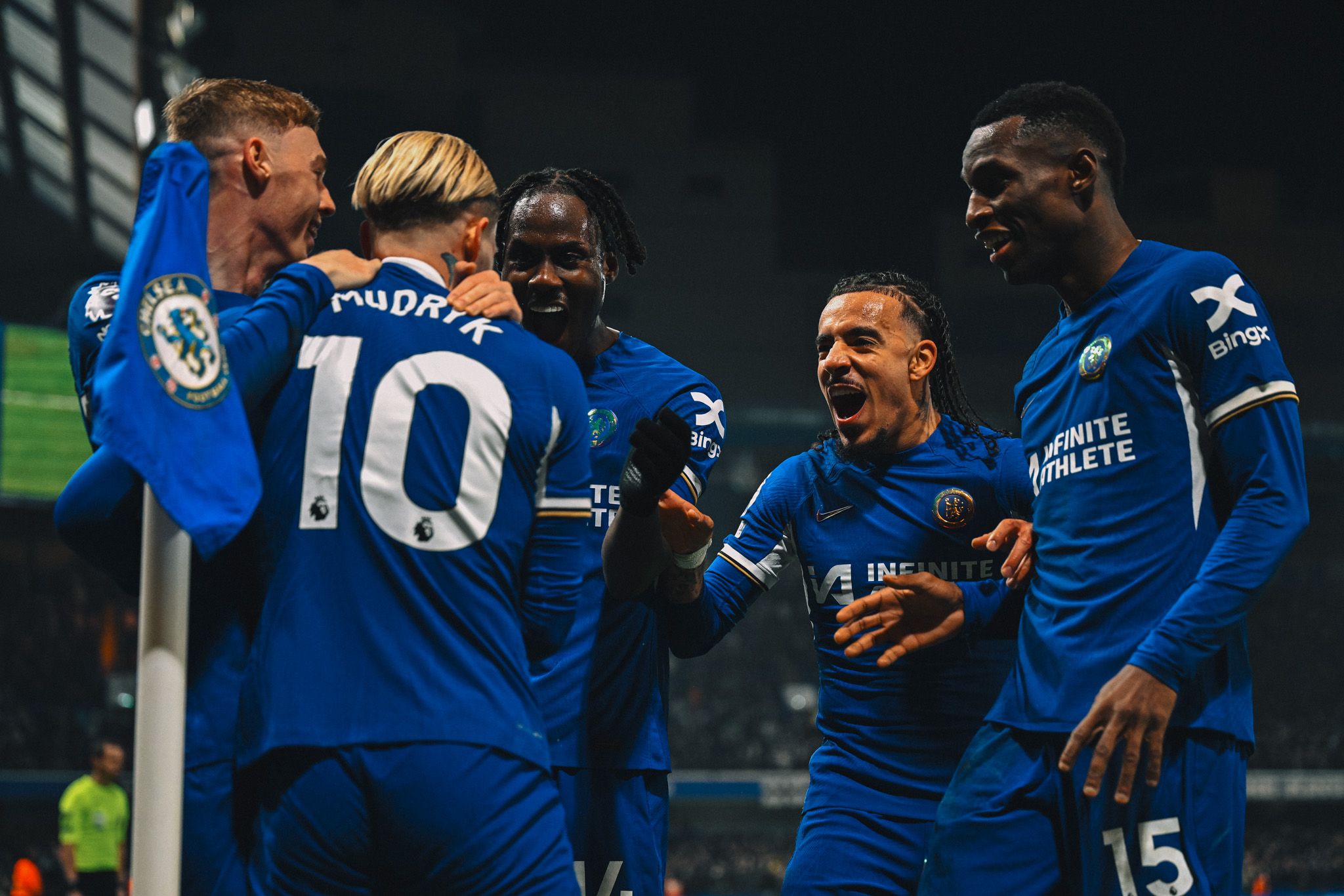 Chelsea players celebrate a goal.