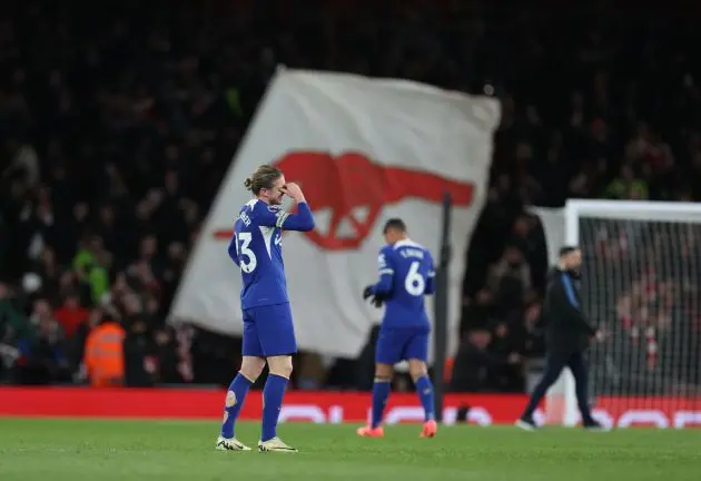 Chelsea players disappointed after Arsenal defeat.
