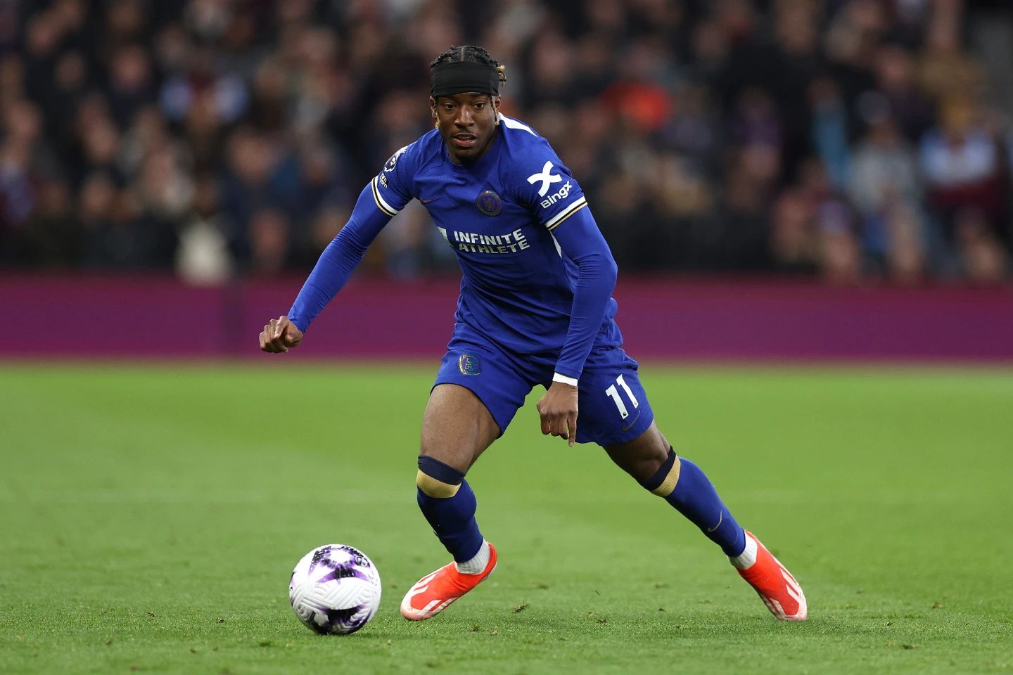 Noni Madueke in action against Aston Villa.
