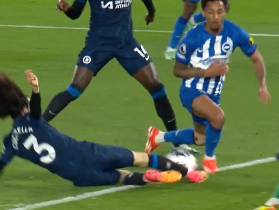 Marc Cucurella makes a risky sliding tackle.