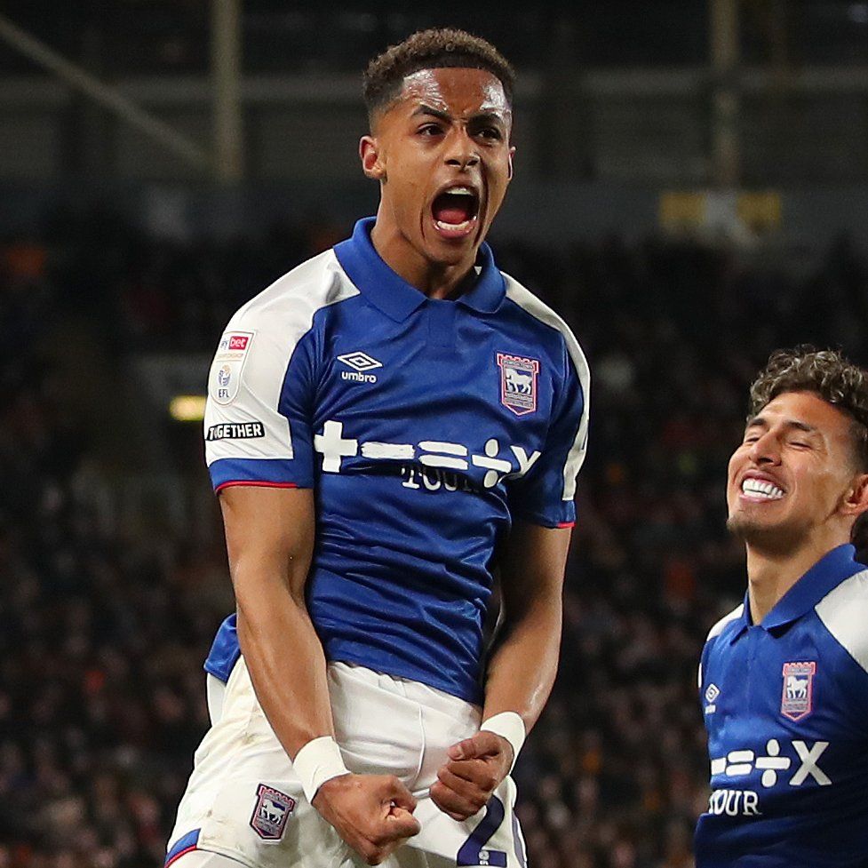 Omari Hutchinson celebrates scoring for Ipswich