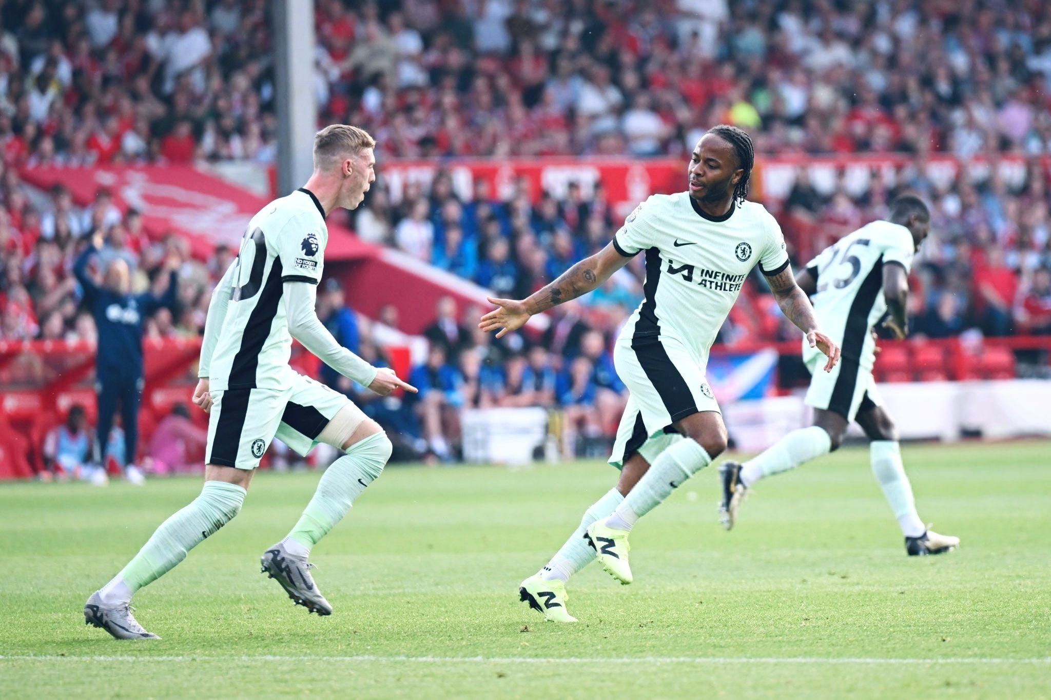 Raheem Sterling celebrates a late goal against Nottingham Forest.
