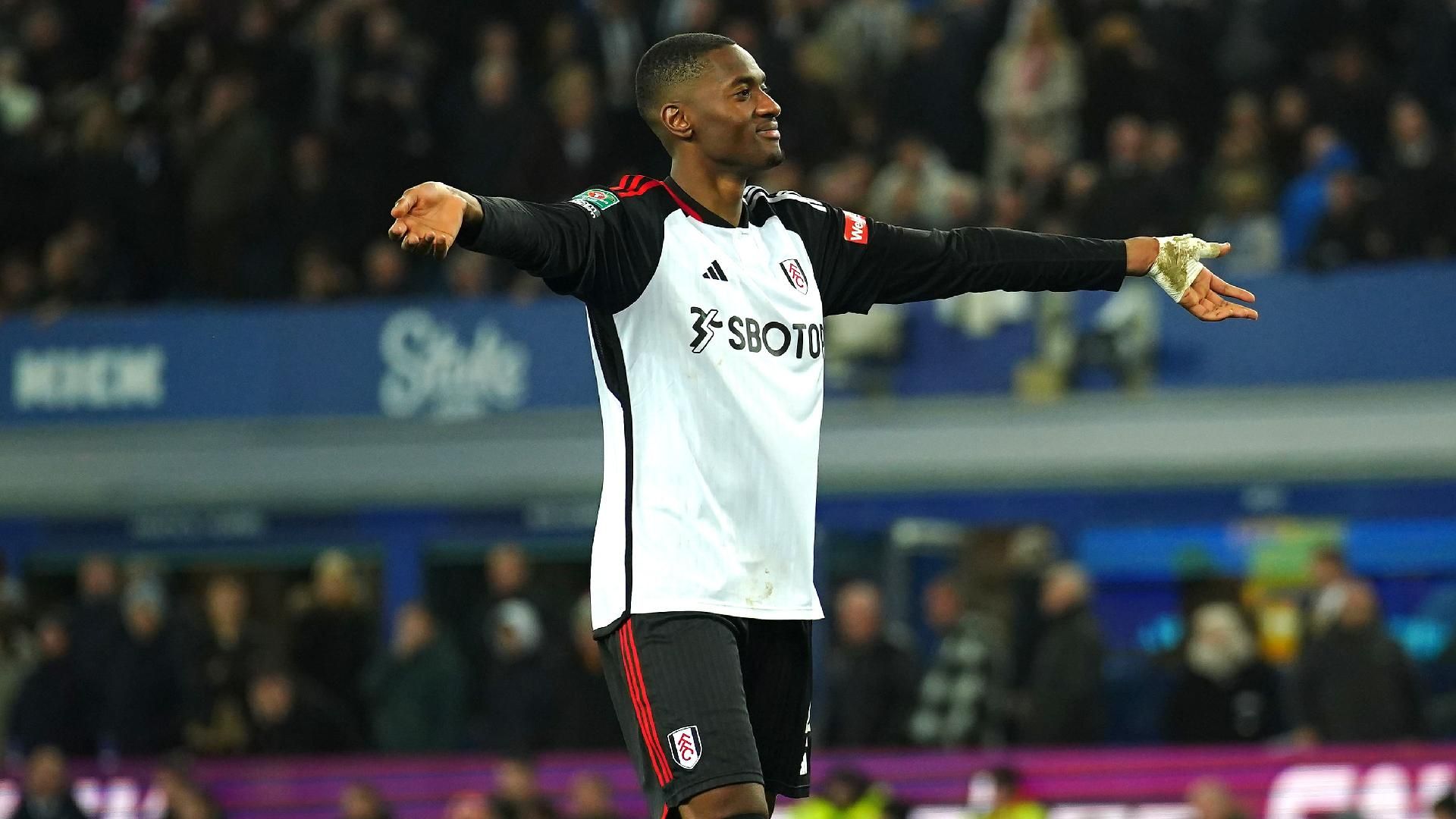 Tosin Adarabioyo celebrates a win with Fulham. Tosin Adarabioyo celebrates a win with Fulham.