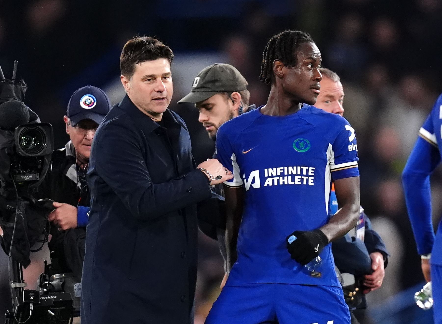 Trevoh Chalobah with Mauricio Pochettino at full time.