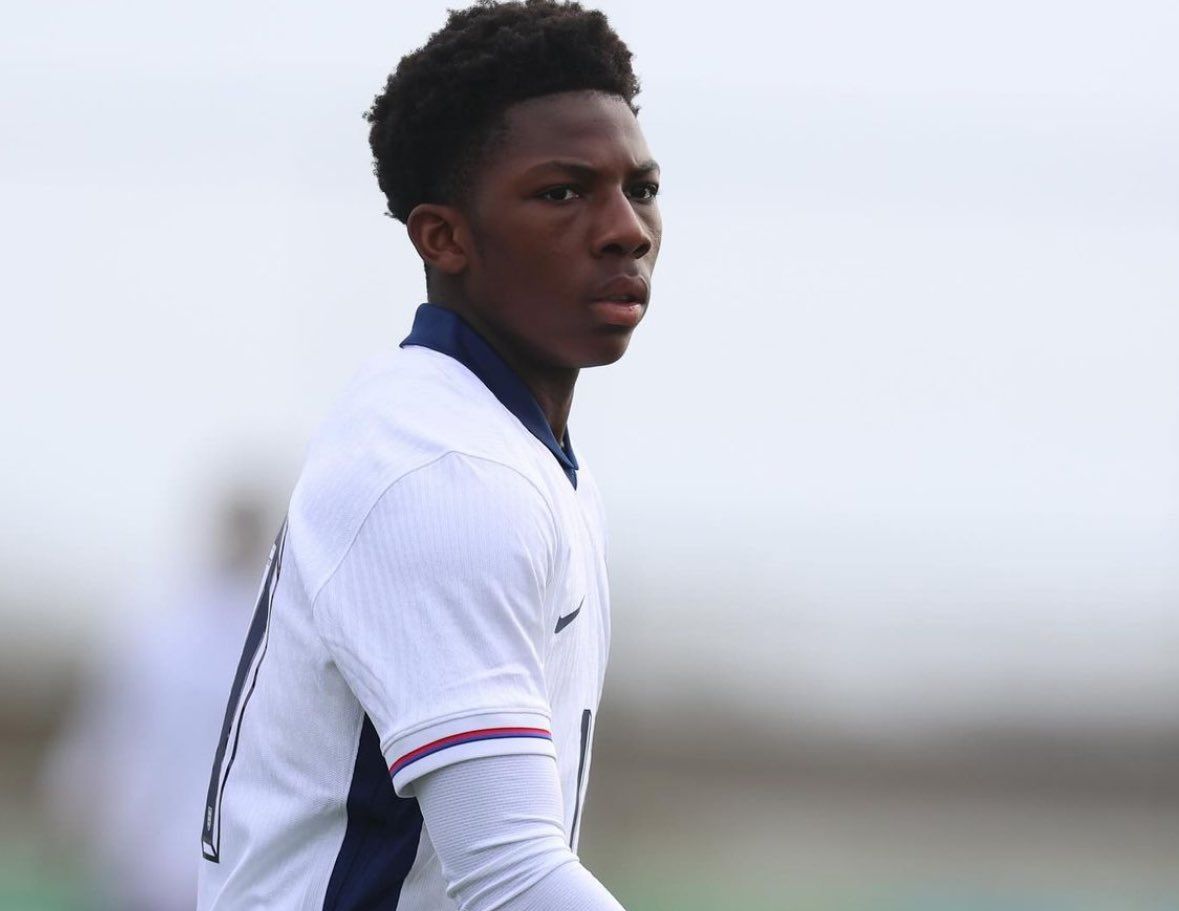 Ryan McAidoo playing for England.