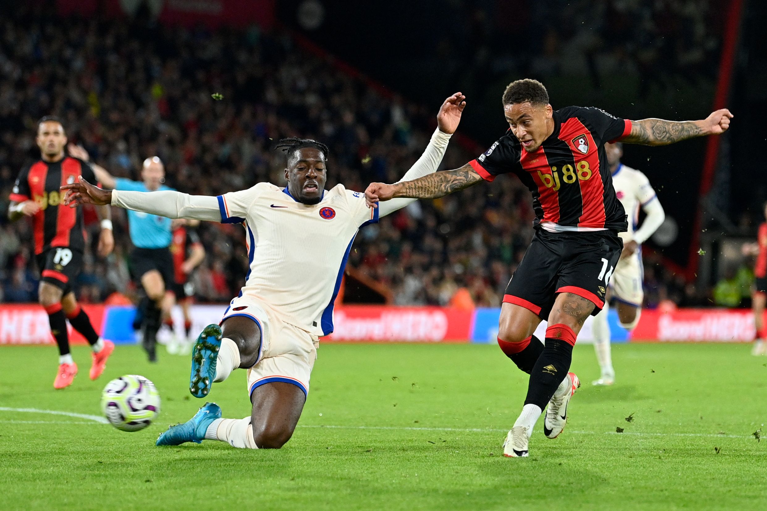 Axel Disasi makes a desperate block against Bournemouth. (Photo by JUSTIN TALLIS/AFP via Getty Images)