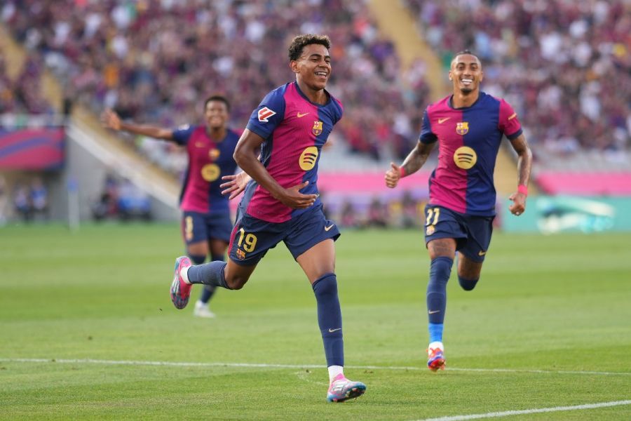 Lamine Yamal celebrates a goal for Barcelona (Photo by Alex Caparros/Getty Images)