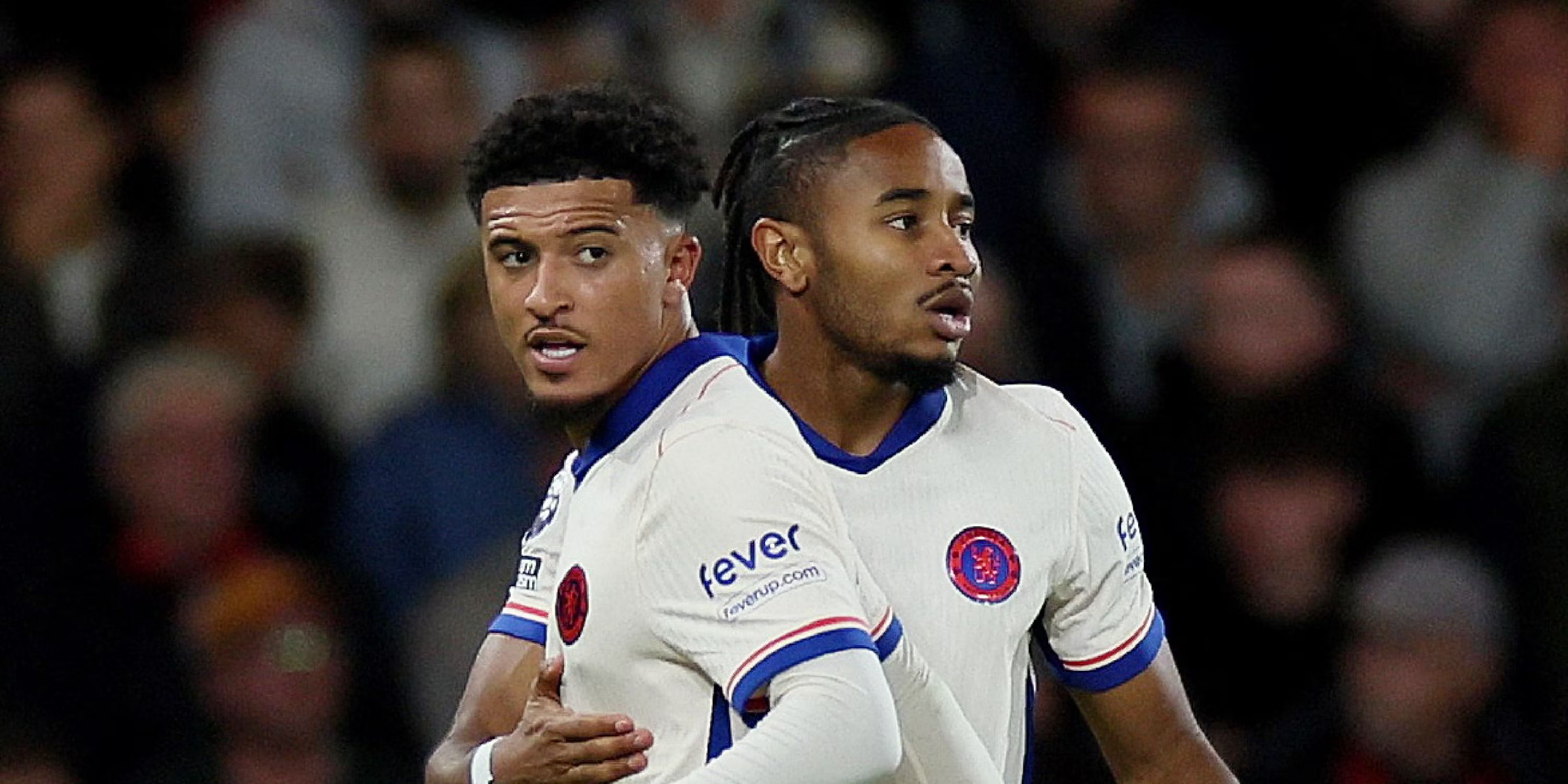 Jadon Sancho and Christopher Nkunku after combining for a goal.