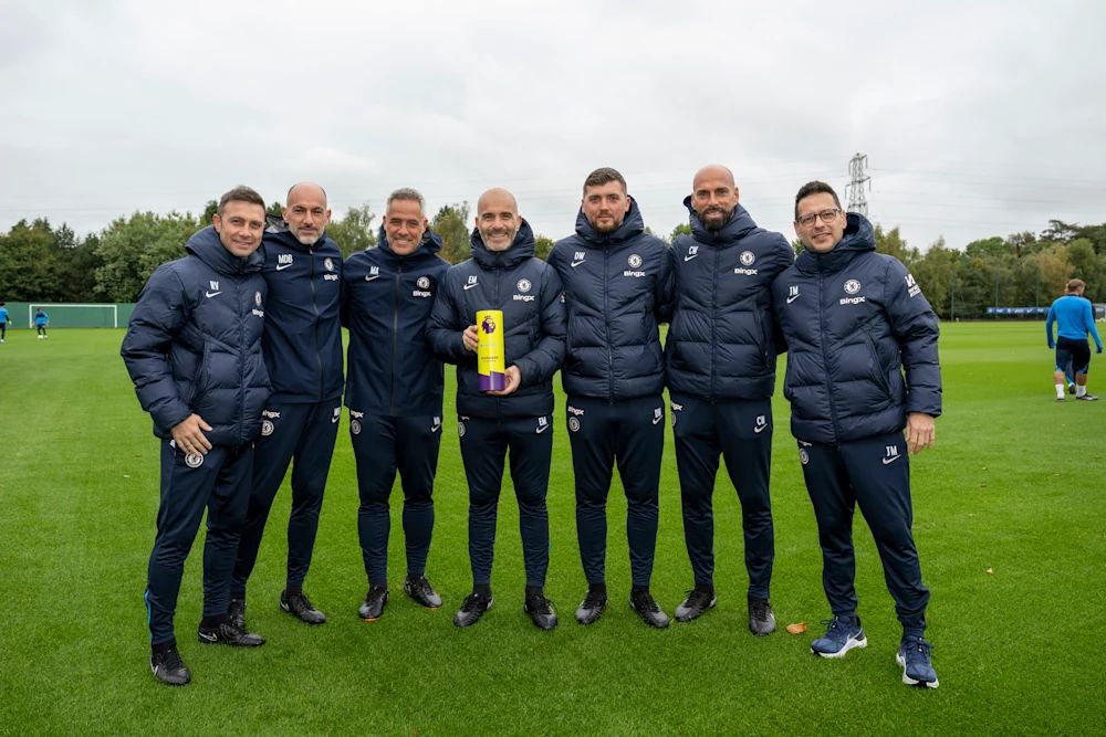 Enzo Maresca and his staff celebrate the Manager of the Month award at Cobham. Enzo Maresca and his staff celebrate the Manager of the Month award at Cobham.