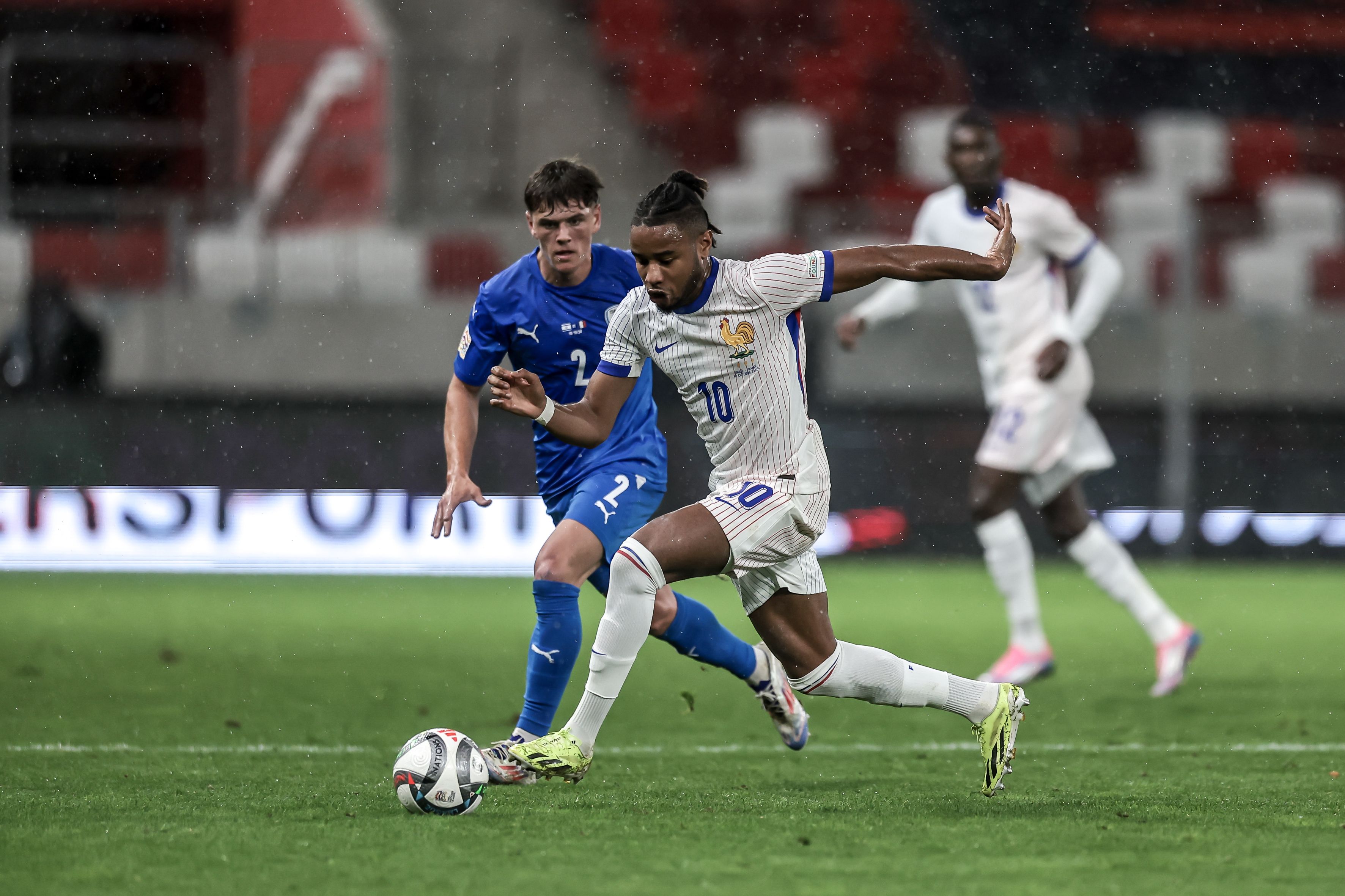 Christopher Nkunku runs with the ball for France. (Photo by David Balogh/Getty Images)