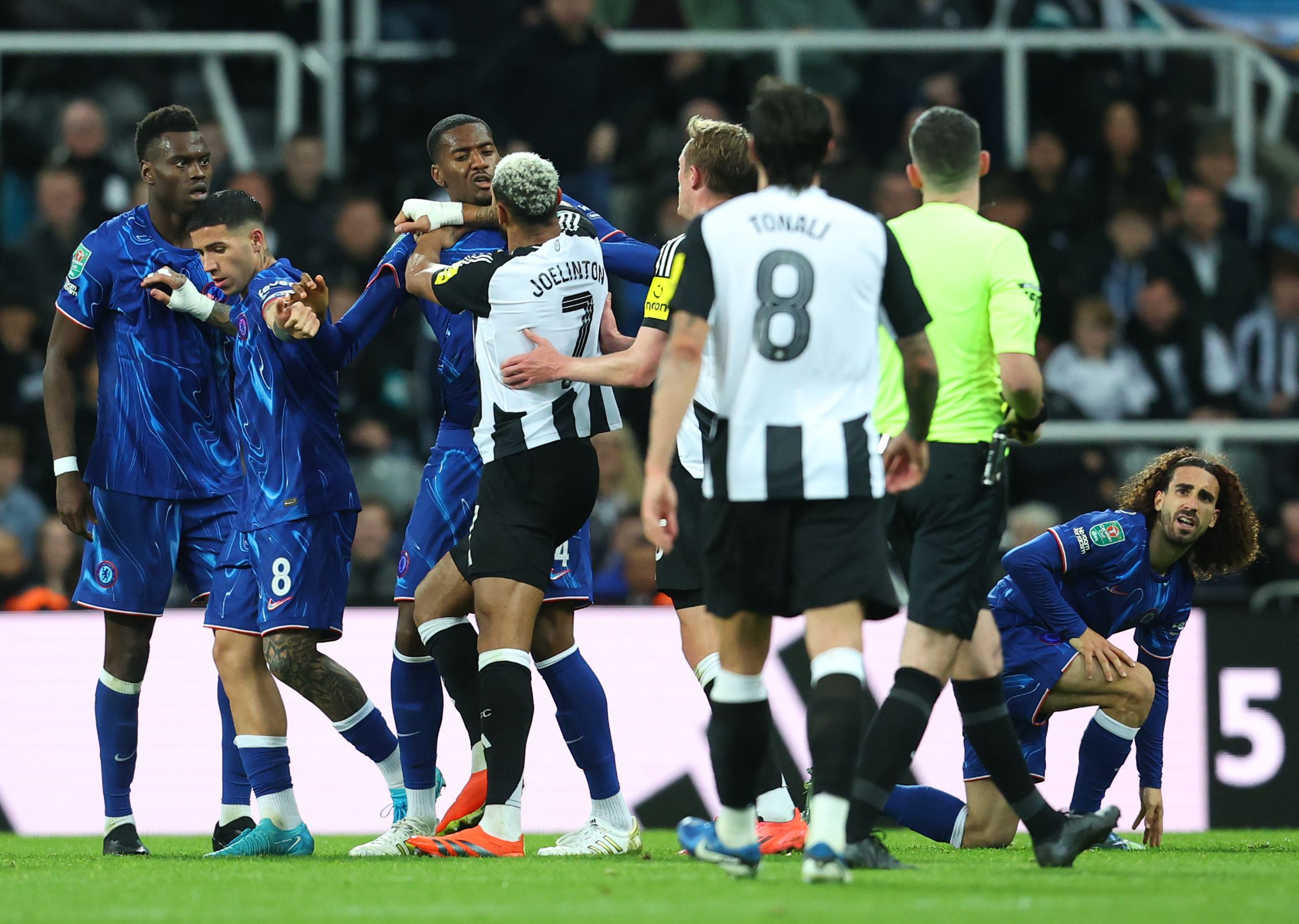 Tosin Adarabioyo clashes with Joelinton. (Photo by Ed Sykes/Getty Images)