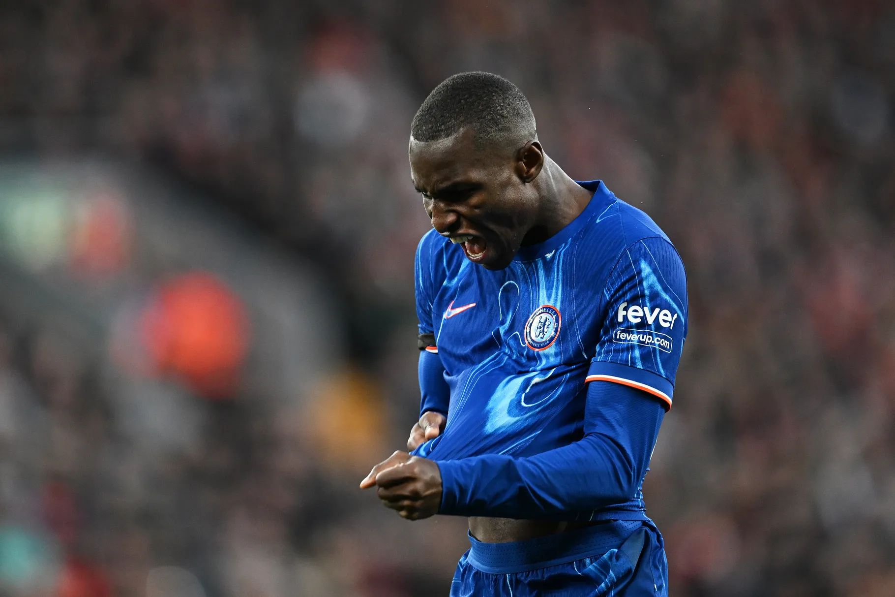 Nicolas Jackson celebrates scoring for Chelsea against Liverpool.
