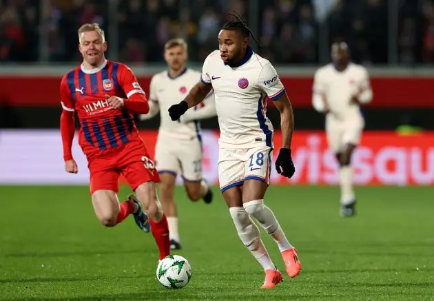 Christopher Nkunku runs with the ball against Heidenheim. (Photo by Alexander Hassenstein/Getty Images)