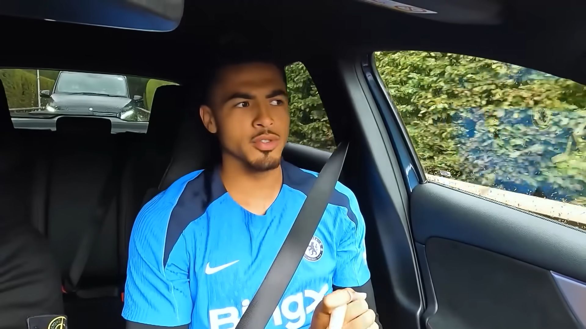 Levi Colwill in a car talking about FIFA.