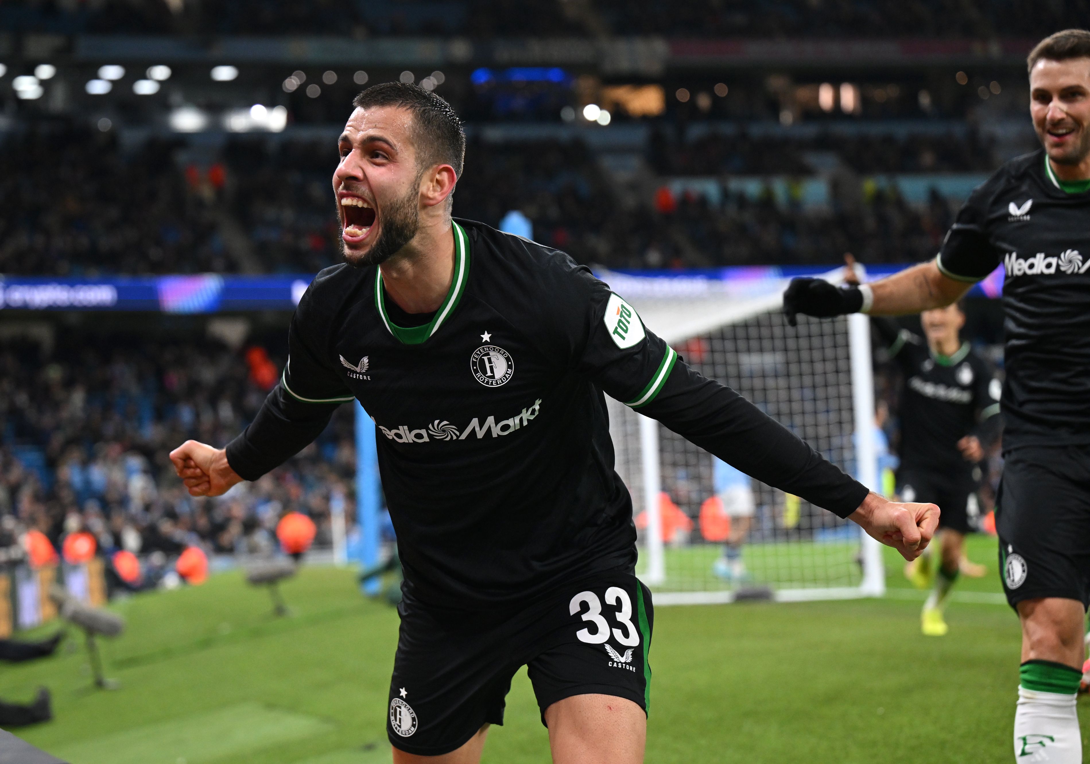 David Hancko celebrates a Feyenood goal.