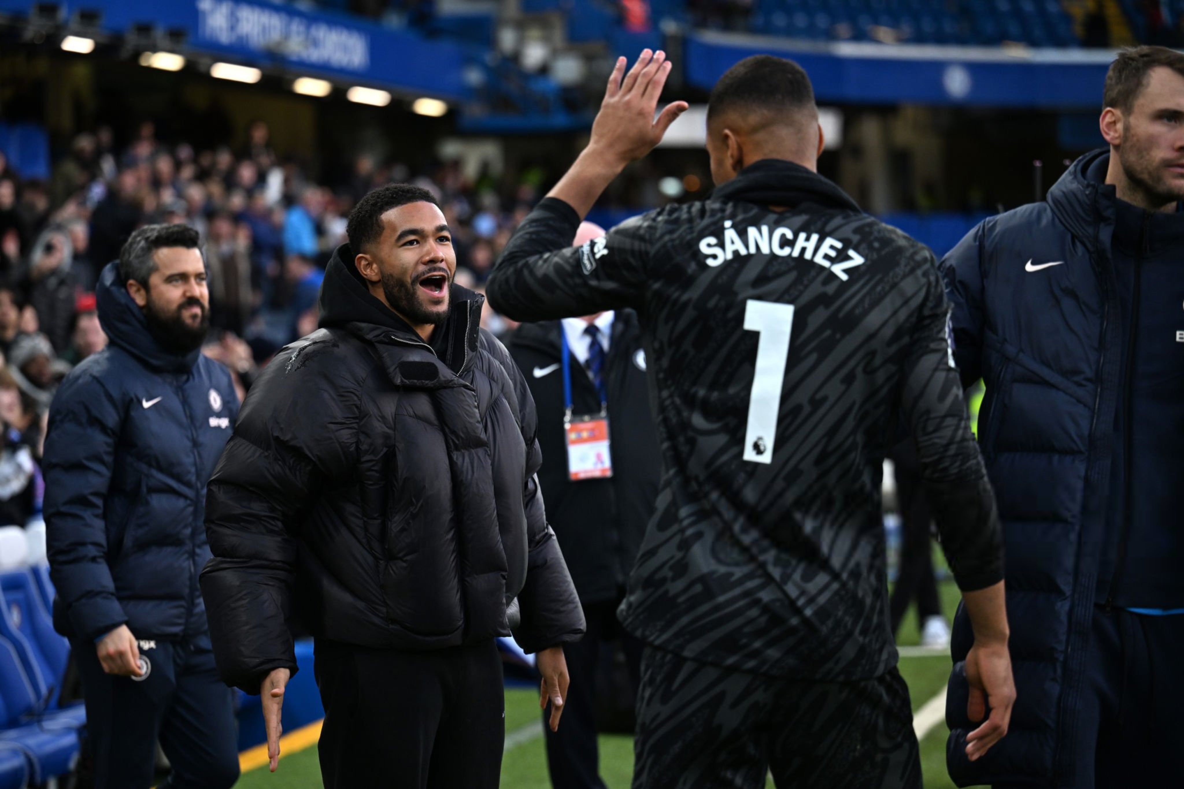 Reece James and Robert Sanchez embrace