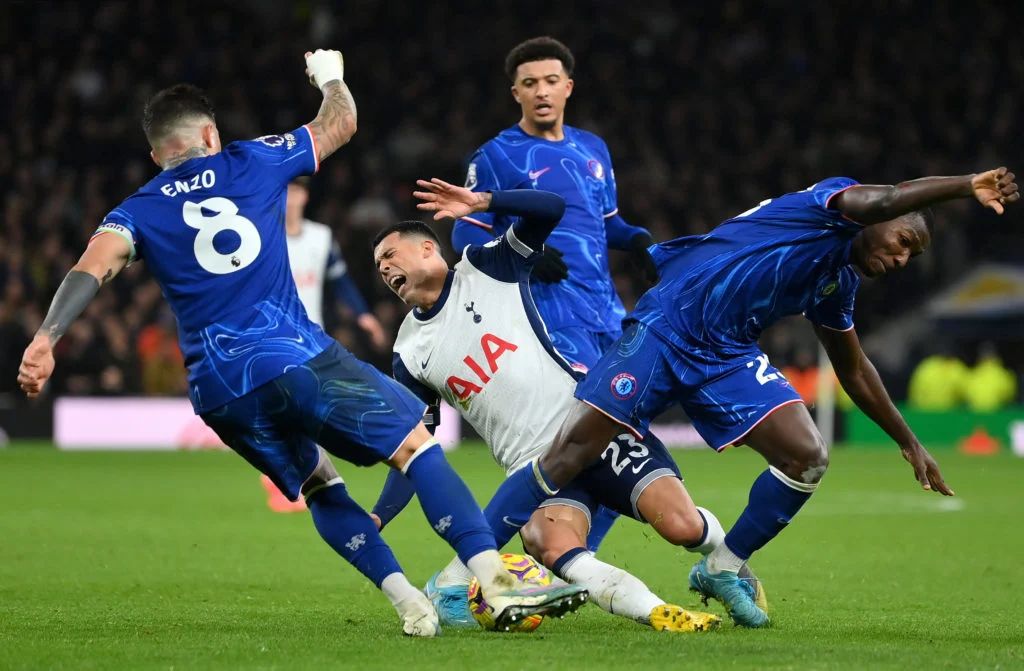 Enzo Fernandez gets stuck in against Tottenham. (Photo by Justin Setterfield/Getty Images)