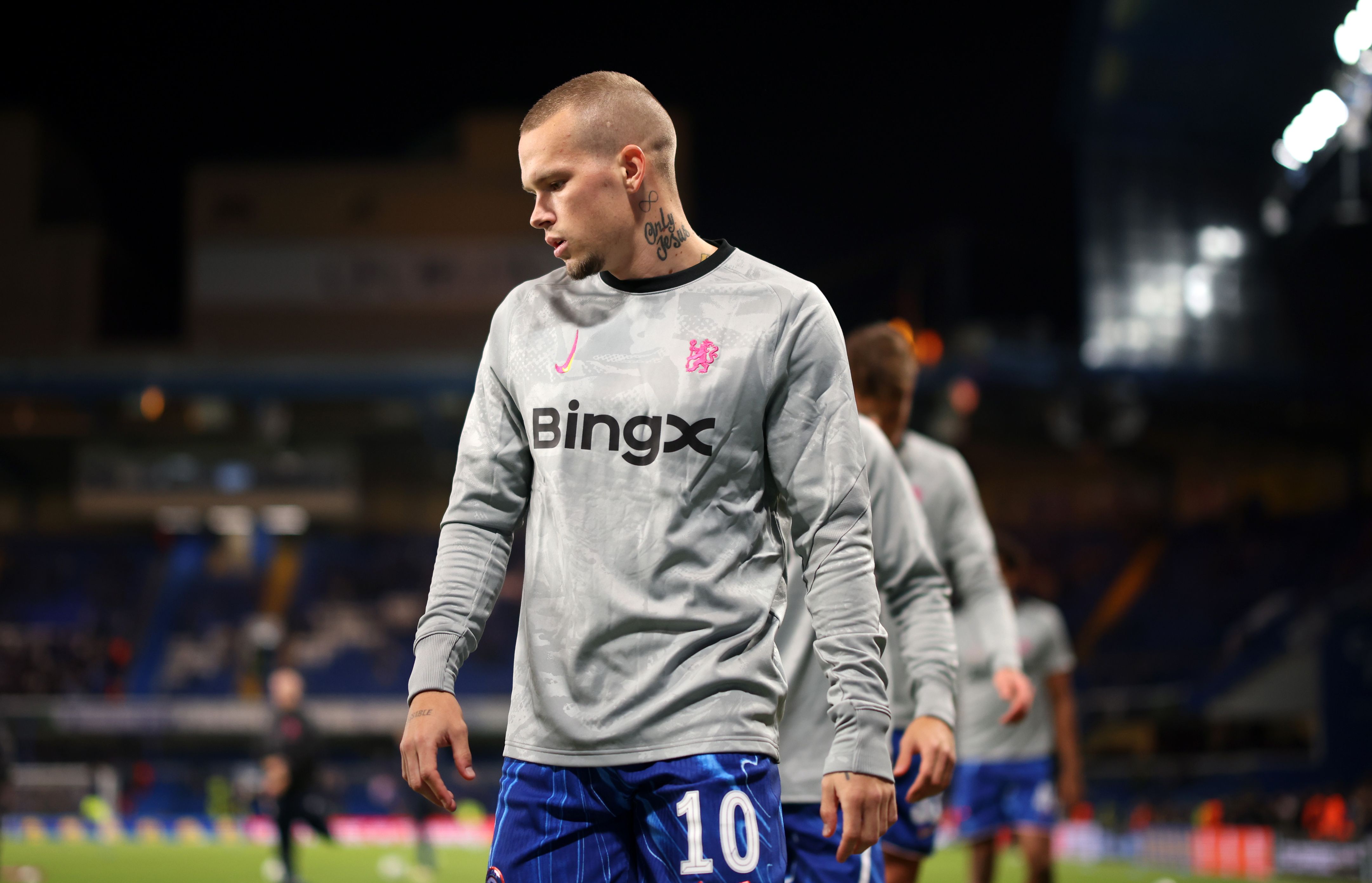 Mykhailo Mudryk looks pensive in a warmup. (Photo by Ryan Pierse/Getty Images)