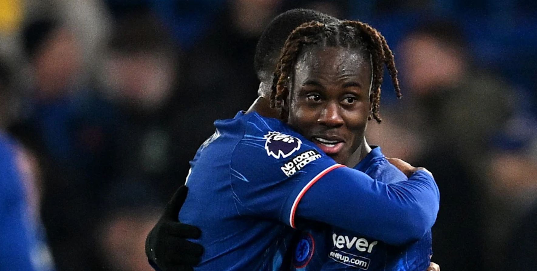 Trevoh Chalobah embraces Tosin on his return to Chelsea. (Photo by Darren Walsh/Chelsea FC)