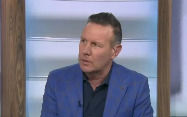 Craig Burley on ESPN in an ugly blazer.