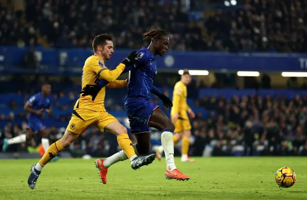Trevoh Chalobah marshalls Wolves attackers. (Photo by Bryn Lennon/Getty Images)