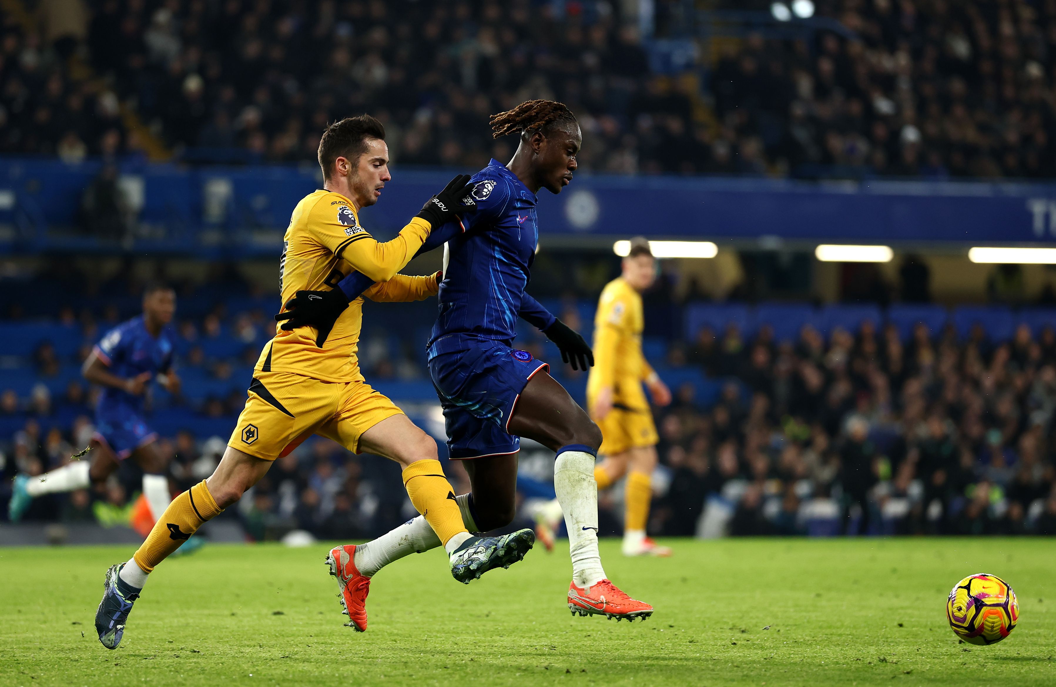 Trevoh Chalobah marshalls Wolves attackers. (Photo by Bryn Lennon/Getty Images)