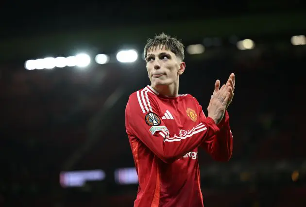 Alejandro Garnacho applauds the Manchester United fans.