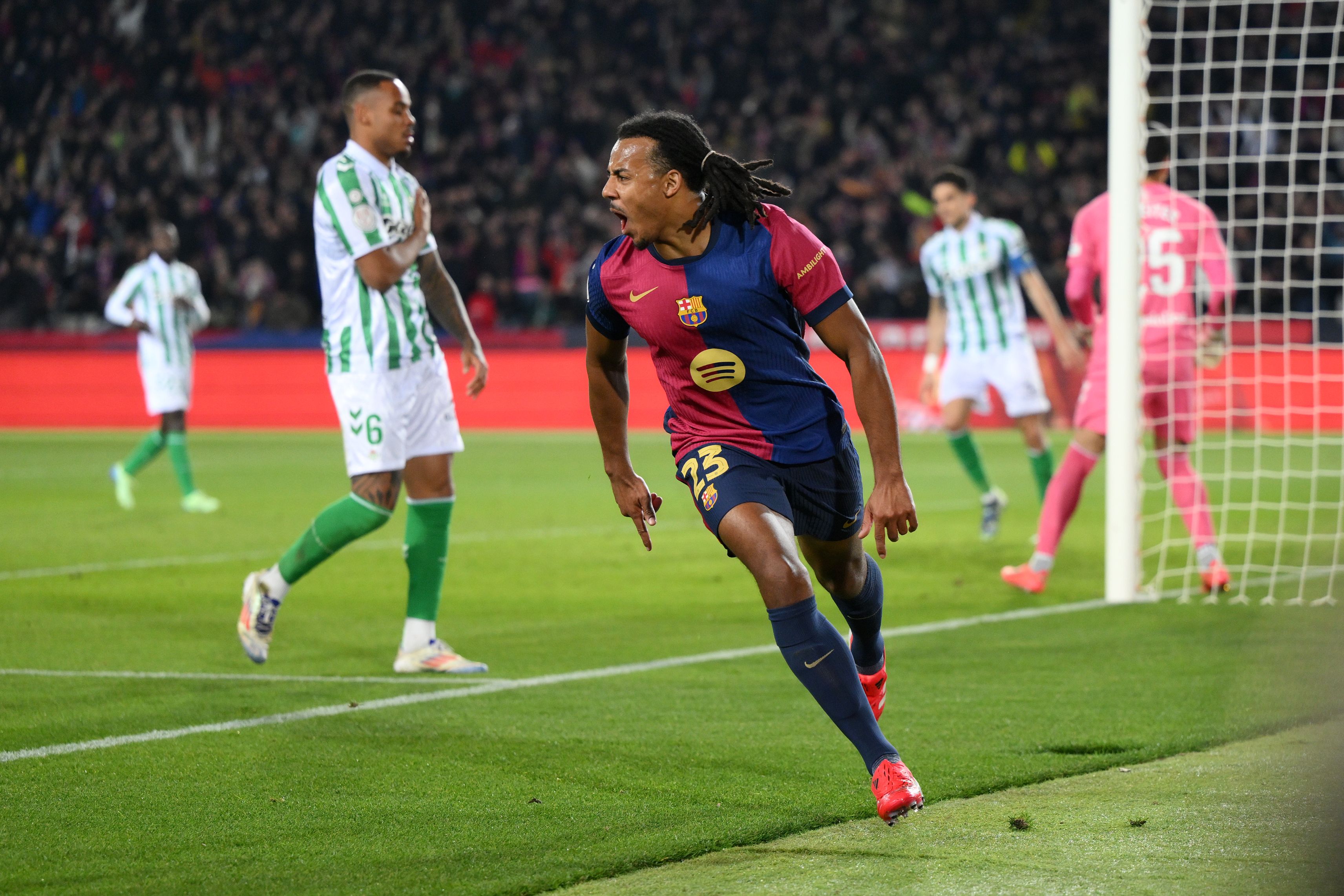 Jules Kounde celebrates scoring for Barcelona.