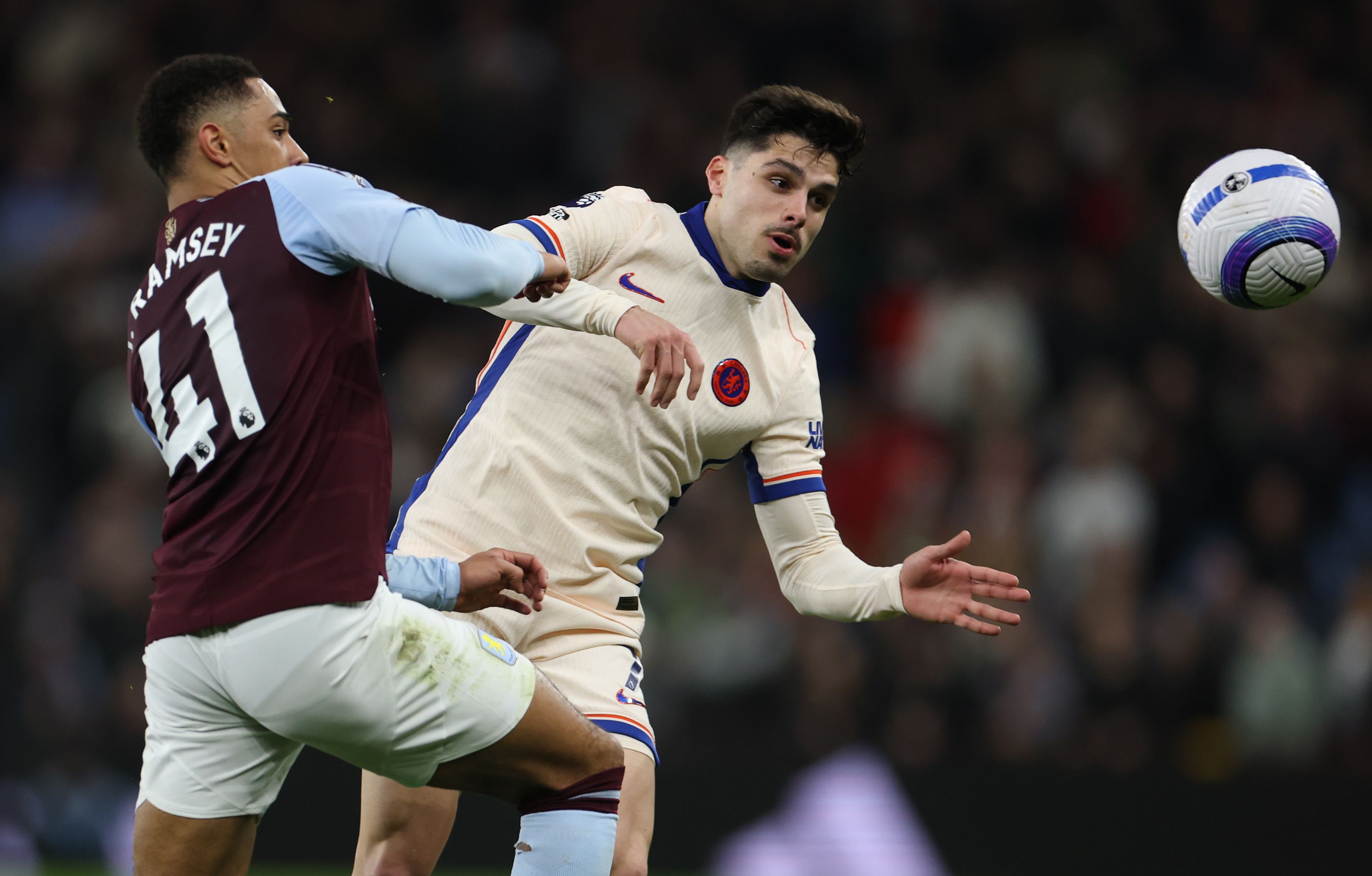Pedro Neto battles for possession against Aston Villa.