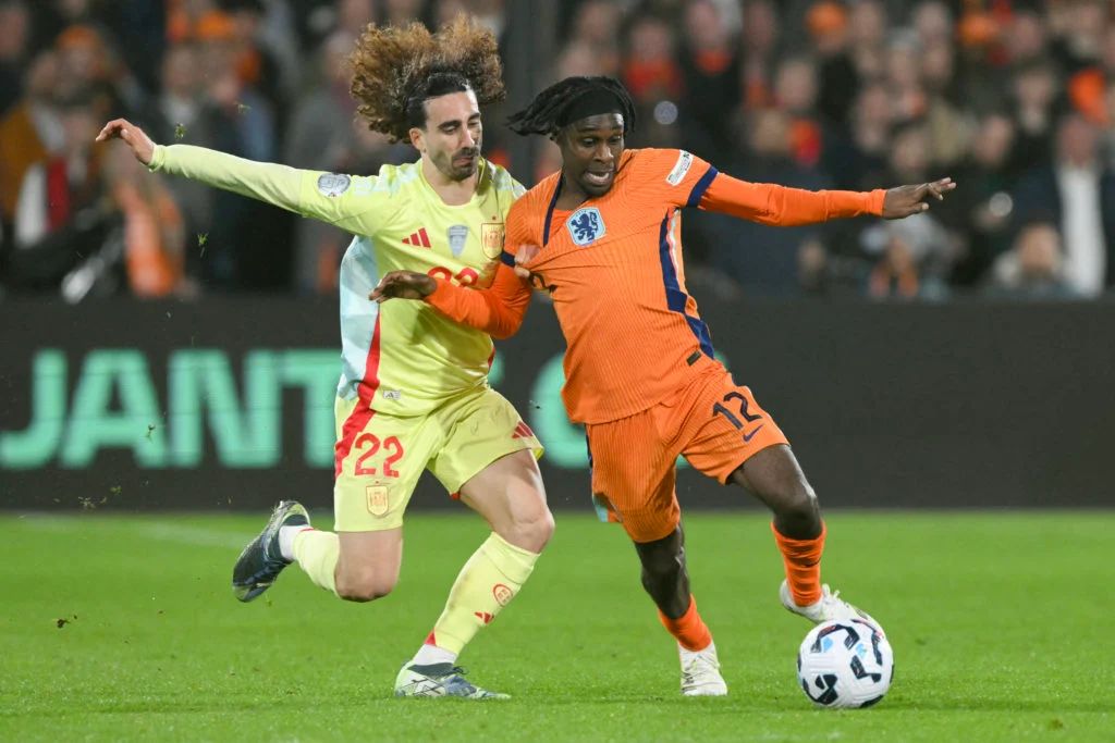 Marc Cucurella battles Jeremie Frimpong for Spain.