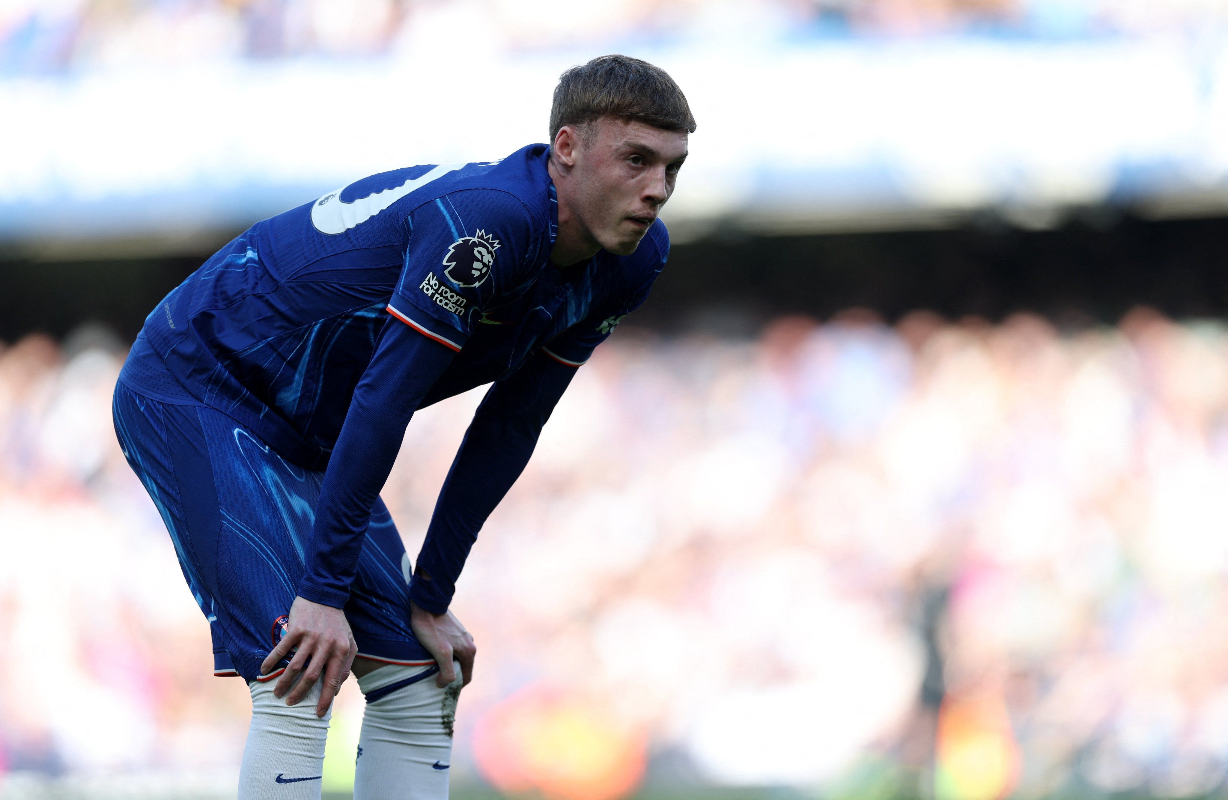 Cole Palmer looks rueful after missing his first penalty for Chelsea. (Photo by Chris Lee/Chelsea FC)