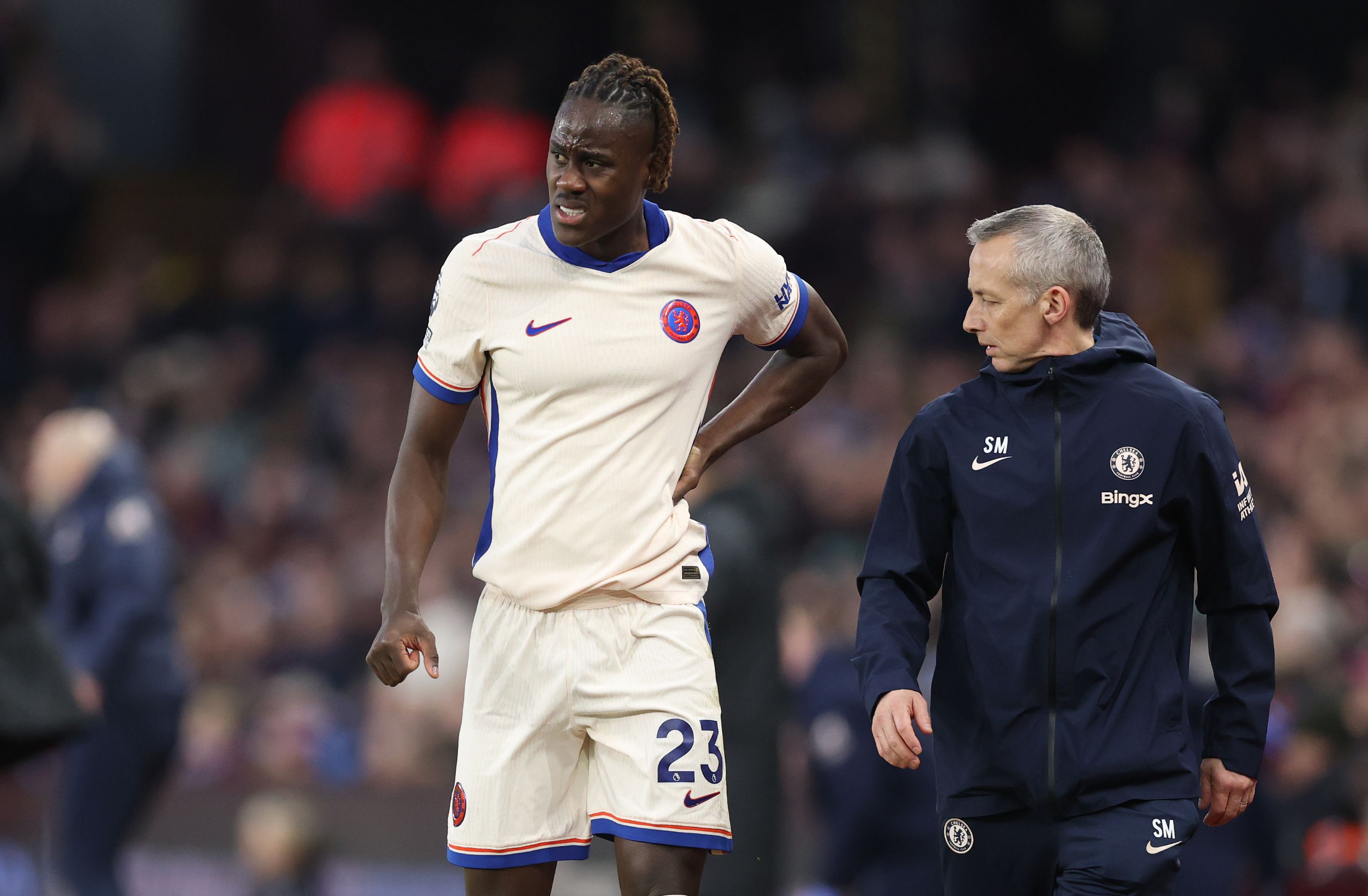 Trevoh Chalobah leaves the pitch injured against Aston Villa.