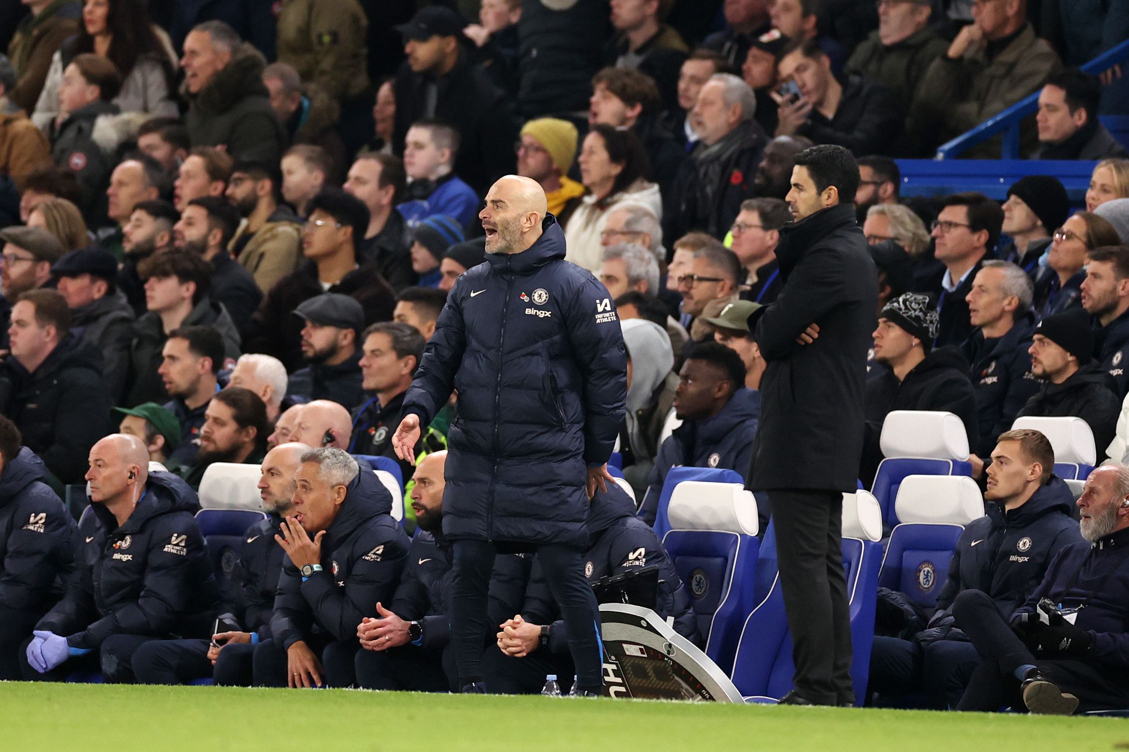 Mikel Arteta and Enzo Maresca on the touchline at Stamford Bridge.